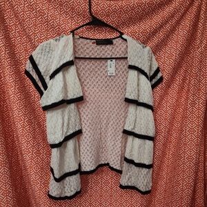 The limited ruffled short sleeve blouse